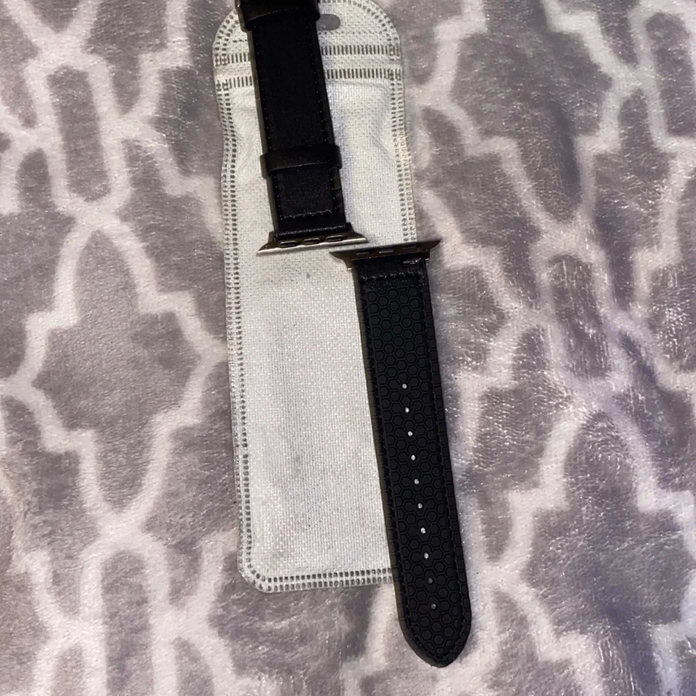 NWT a Apple Watch band black reversible leather side& other is like tire tracks